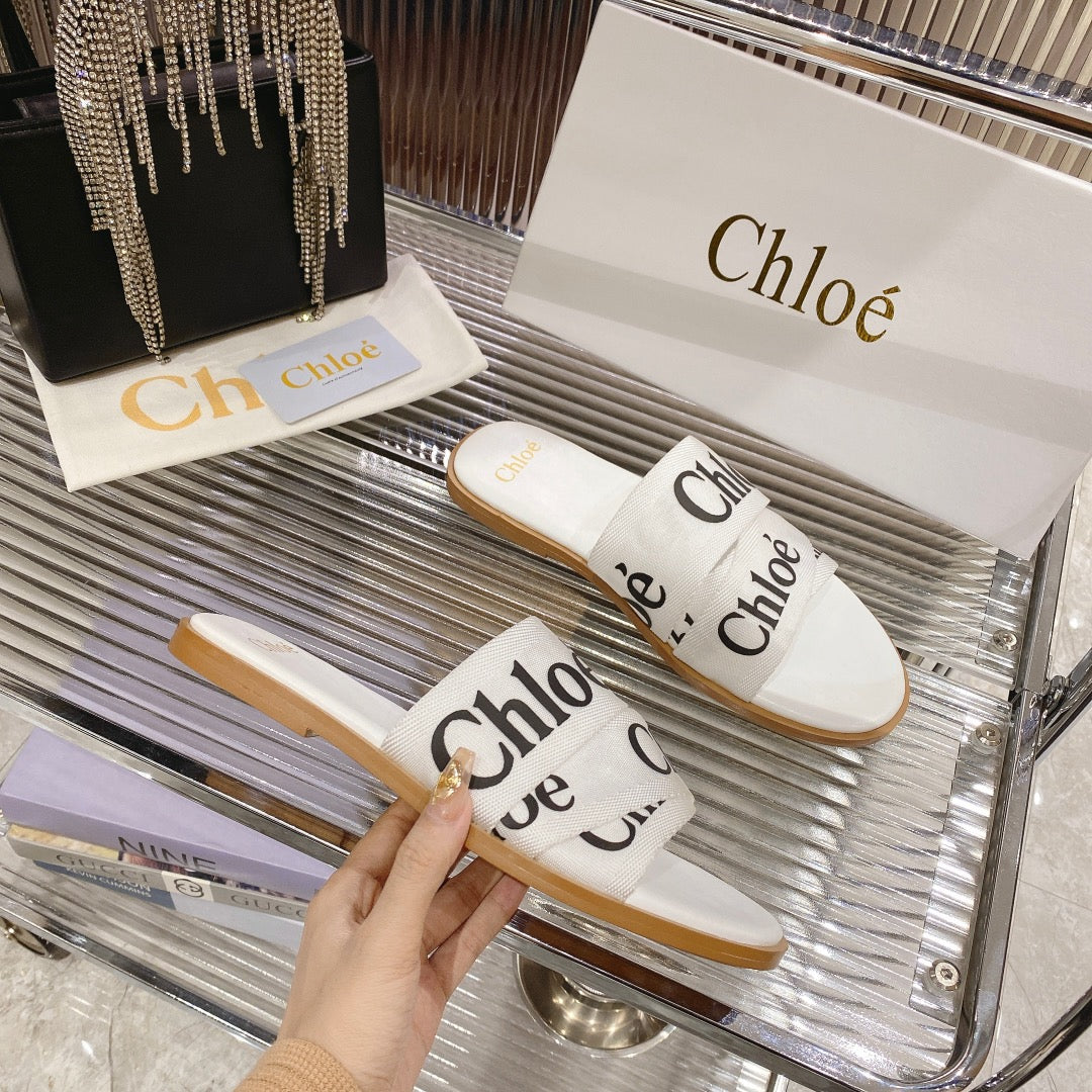 CHLO¨¦ WOODY SLIPPER IN WHITE MIX BLACK CANVAS
