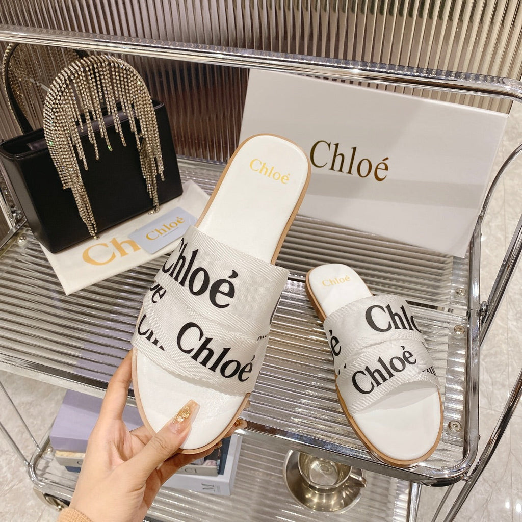 CHLO¨¦ WOODY SLIPPER IN WHITE MIX BLACK CANVAS