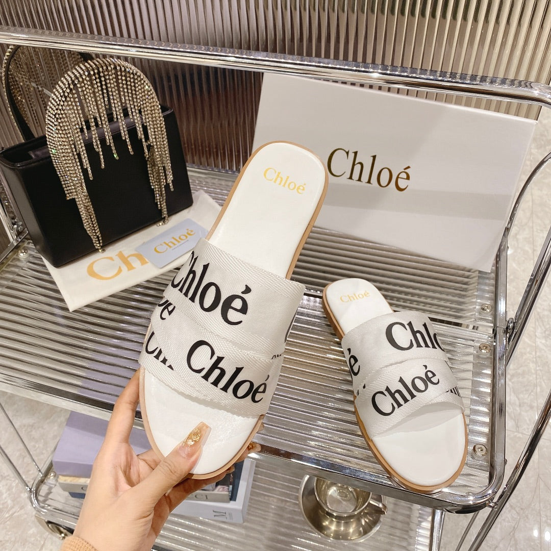 CHLO¨¦ WOODY SLIPPER IN WHITE MIX BLACK CANVAS