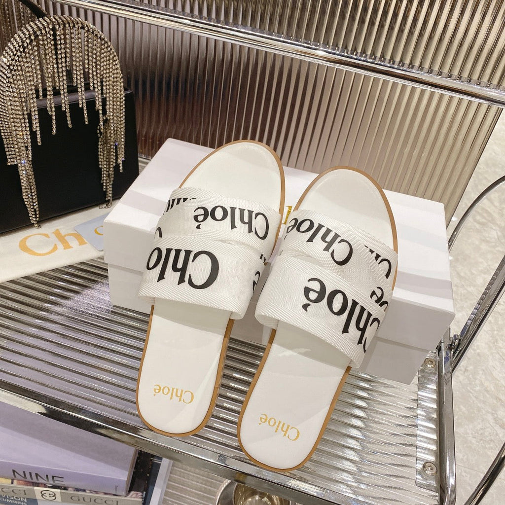 CHLO¨¦ WOODY SLIPPER IN WHITE MIX BLACK CANVAS