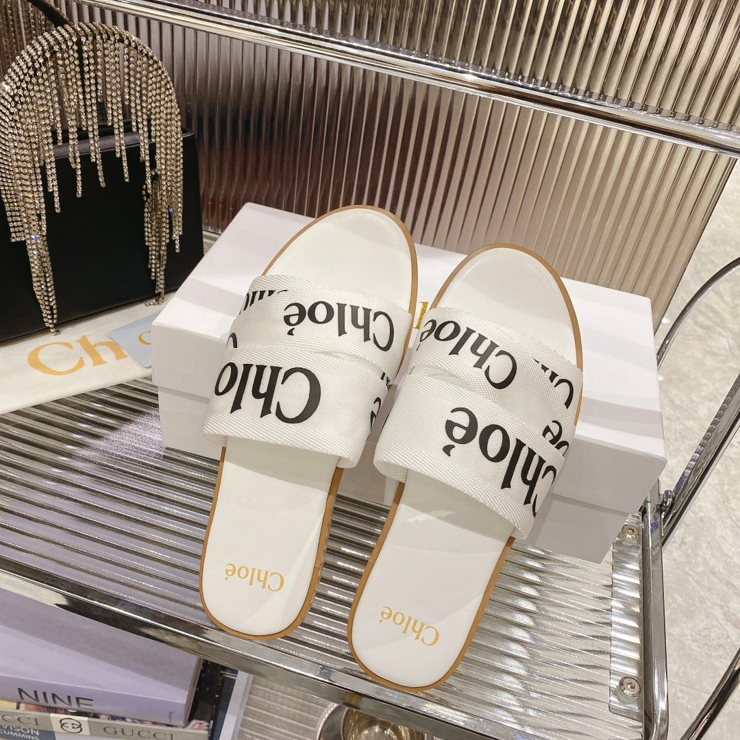 CHLO¨¦ WOODY SLIPPER IN WHITE MIX BLACK CANVAS