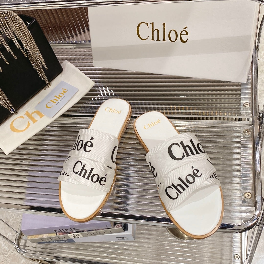 CHLO¨¦ WOODY SLIPPER IN WHITE MIX BLACK CANVAS