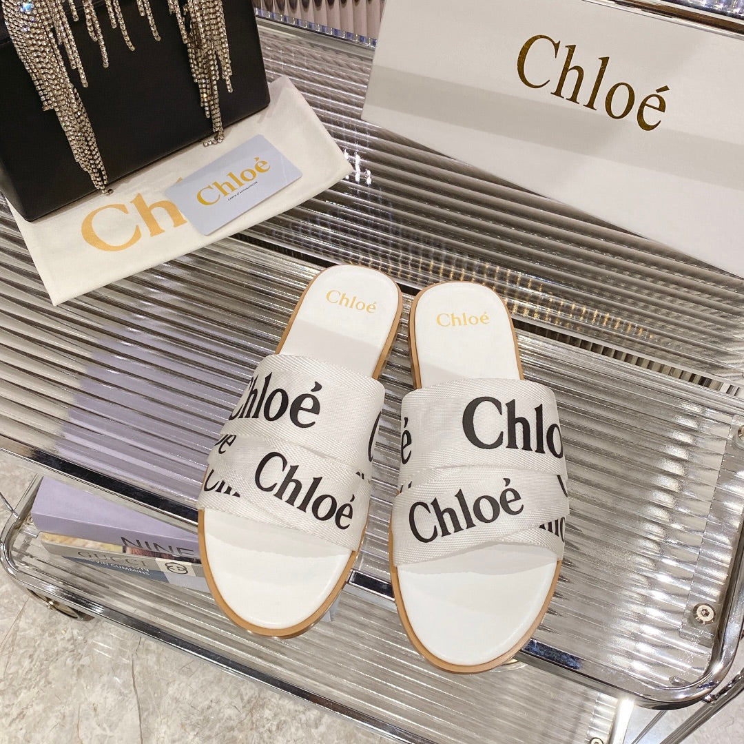 CHLO¨¦ WOODY SLIPPER IN WHITE MIX BLACK CANVAS