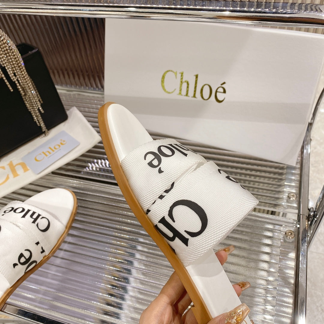 CHLO¨¦ WOODY SLIPPER IN WHITE MIX BLACK CANVAS