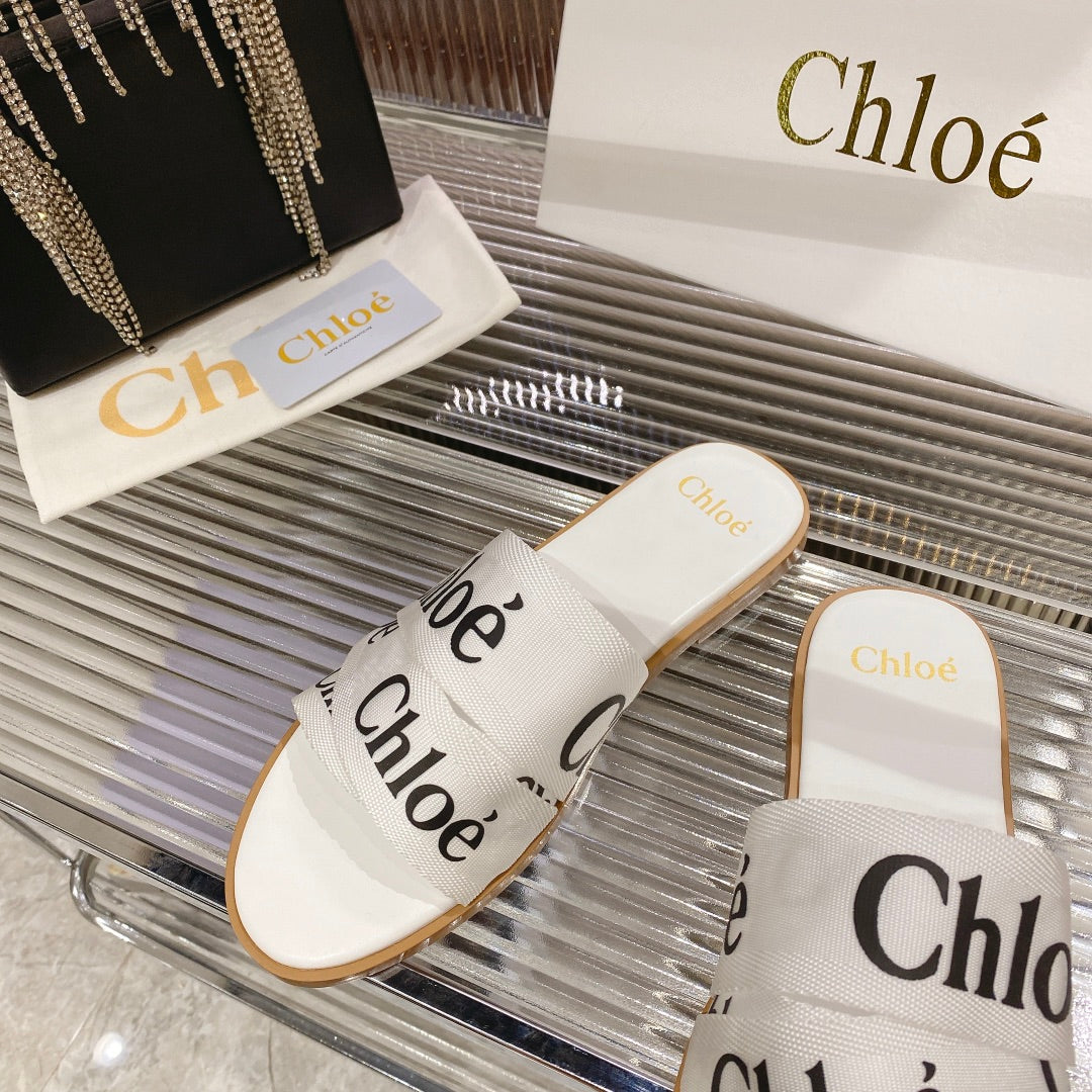 CHLO¨¦ WOODY SLIPPER IN WHITE MIX BLACK CANVAS