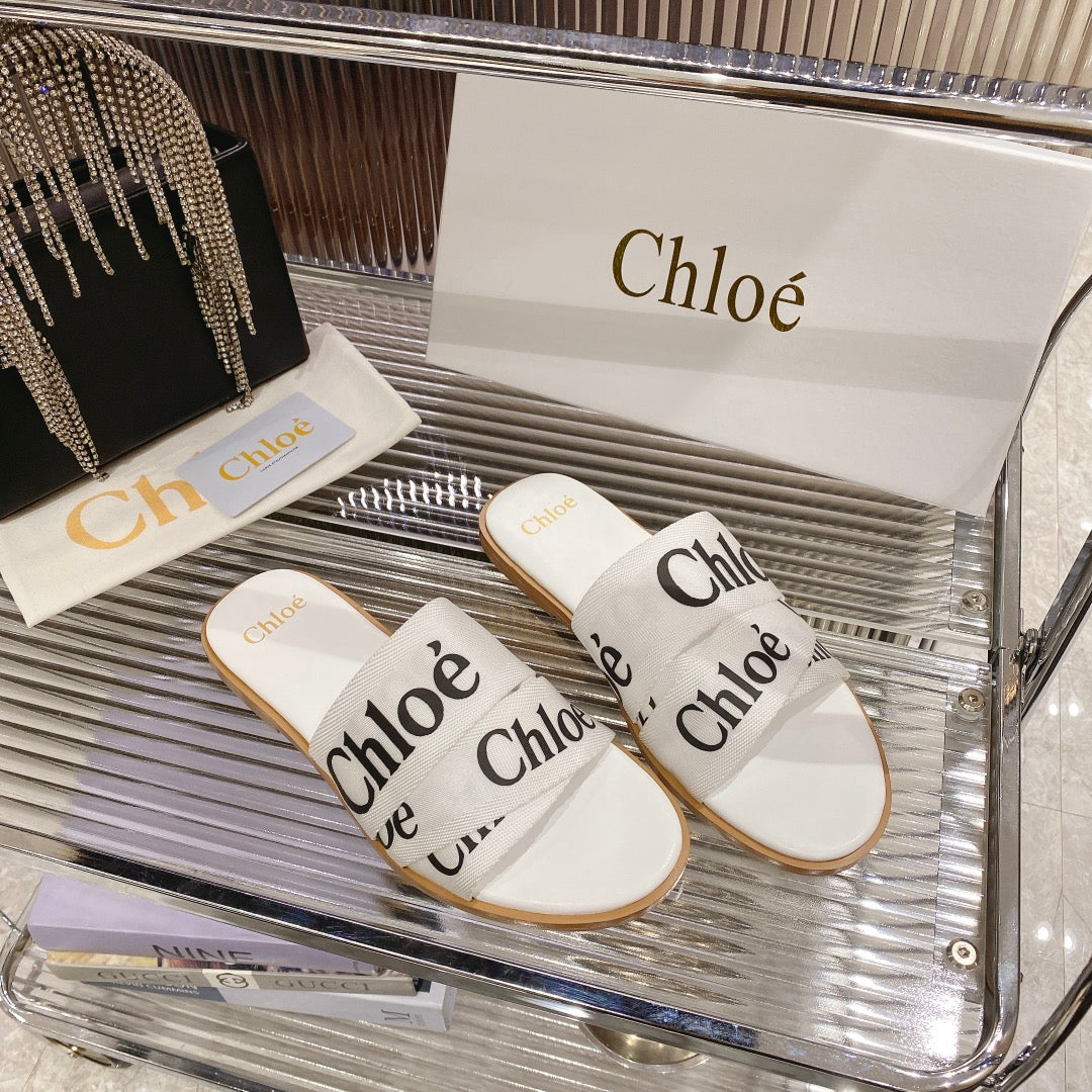 CHLO¨¦ WOODY SLIPPER IN WHITE MIX BLACK CANVAS
