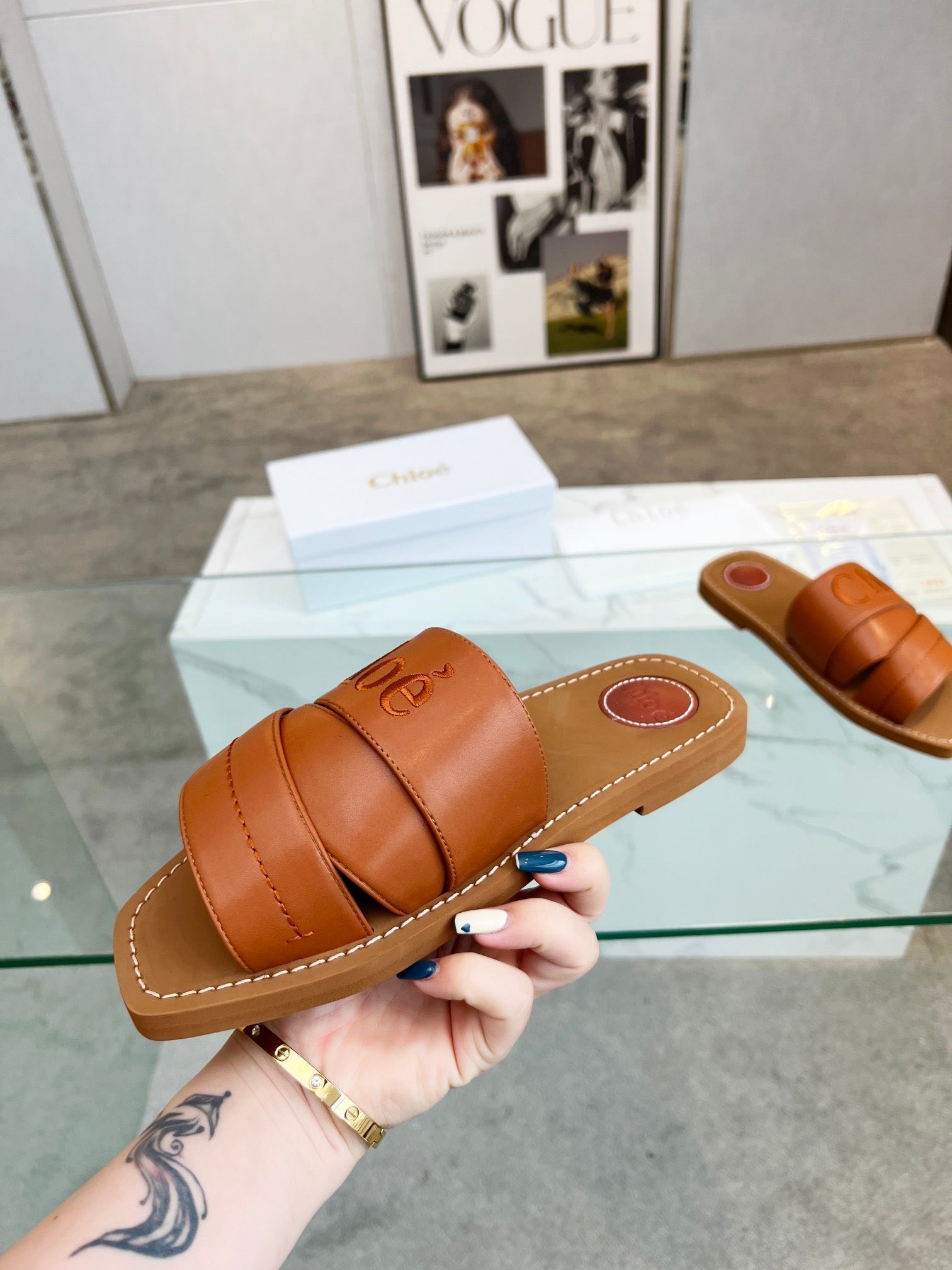 WOODY MULE IN BRONZE BROWM LAMBSKIN WITH EMBROIDERED LOGO