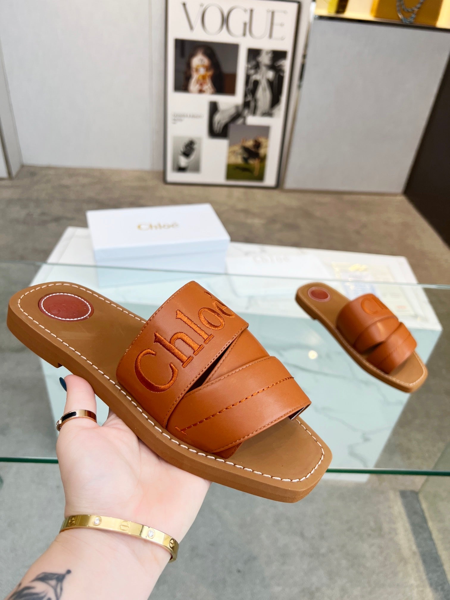 WOODY MULE IN BRONZE BROWM LAMBSKIN WITH EMBROIDERED LOGO