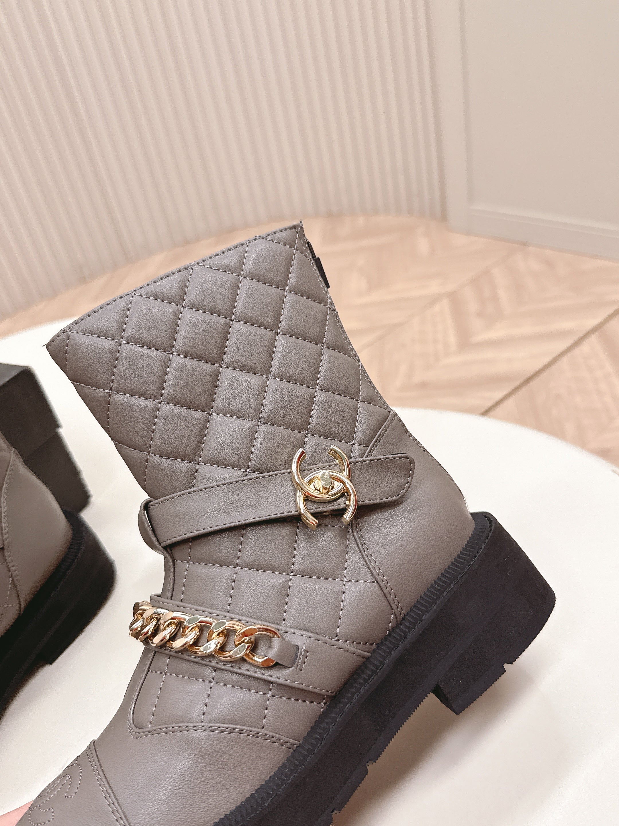 CHANEL ANKLE BOOTS 25S IN SMOKY GREY LAMBSKIN EMBOSSED LOGO WITH GOLD HARDWARE