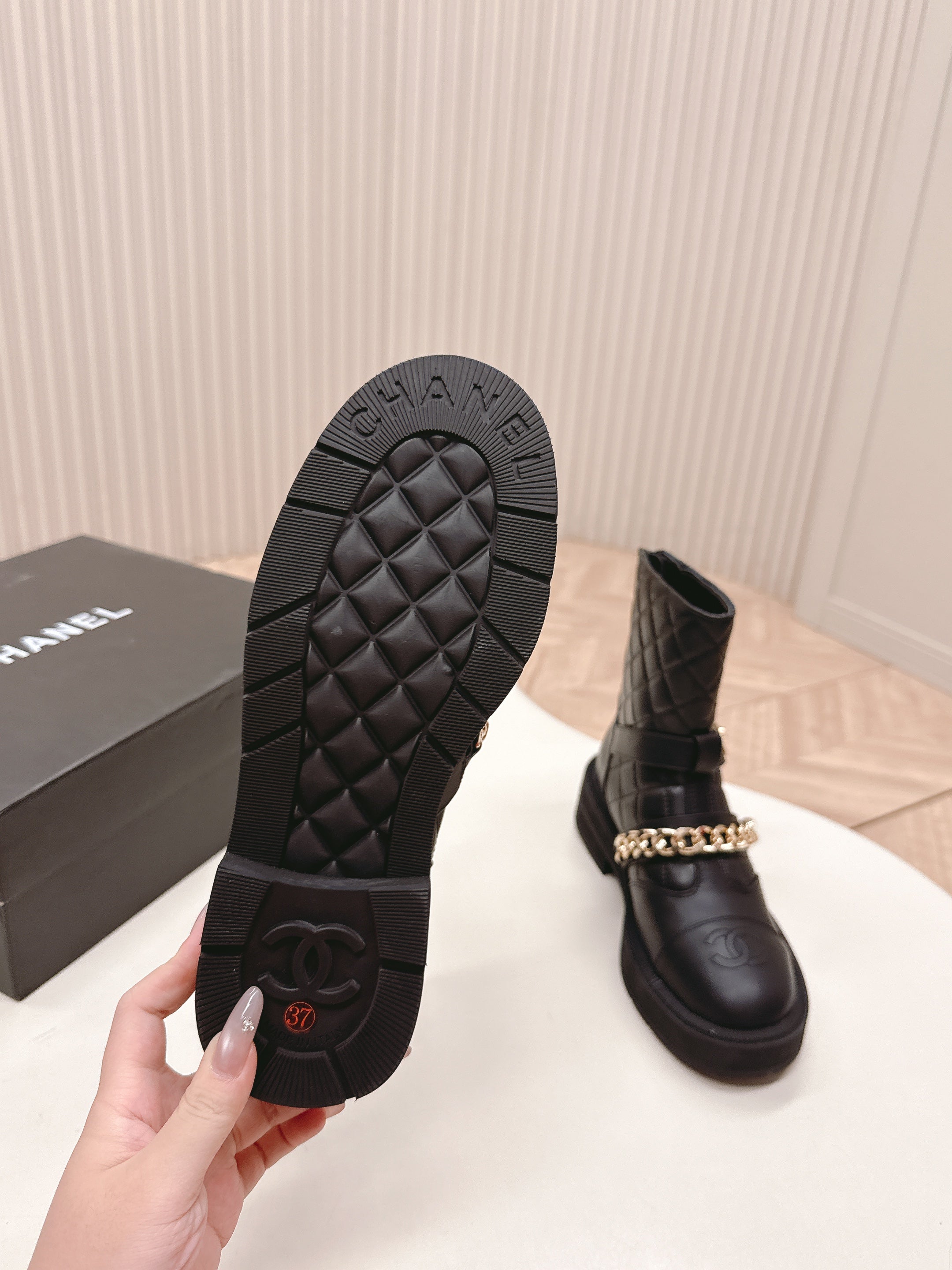 CHANEL ANKLE BOOTS 25S IN BLACK LAMBSKIN EMBOSSED LOGO WITH GOLD HARDWARE