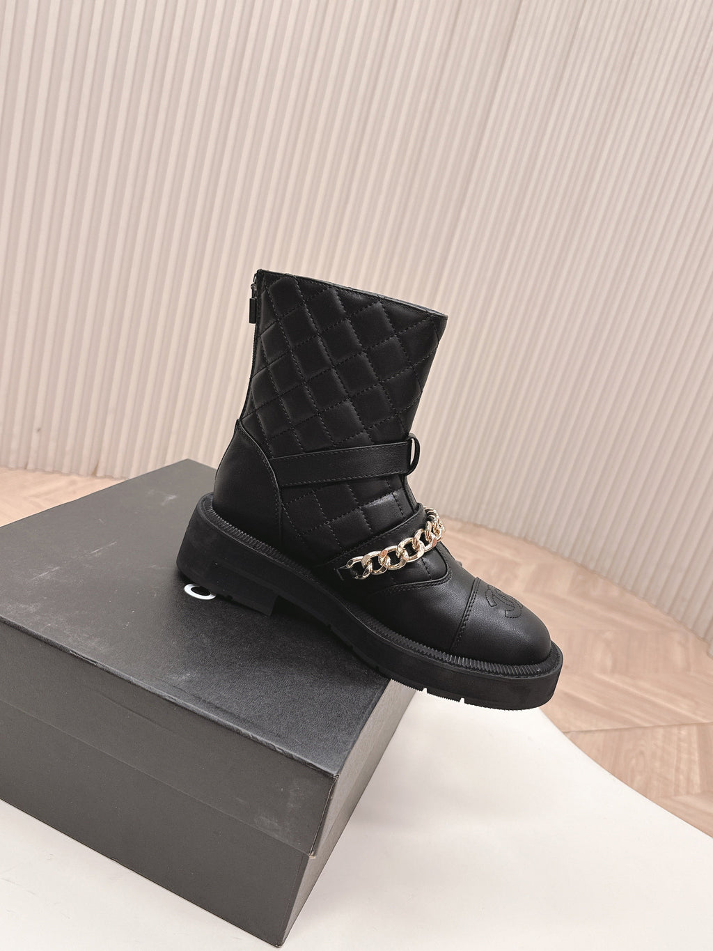 CHANEL ANKLE BOOTS 25S IN BLACK LAMBSKIN EMBOSSED LOGO WITH GOLD HARDWARE