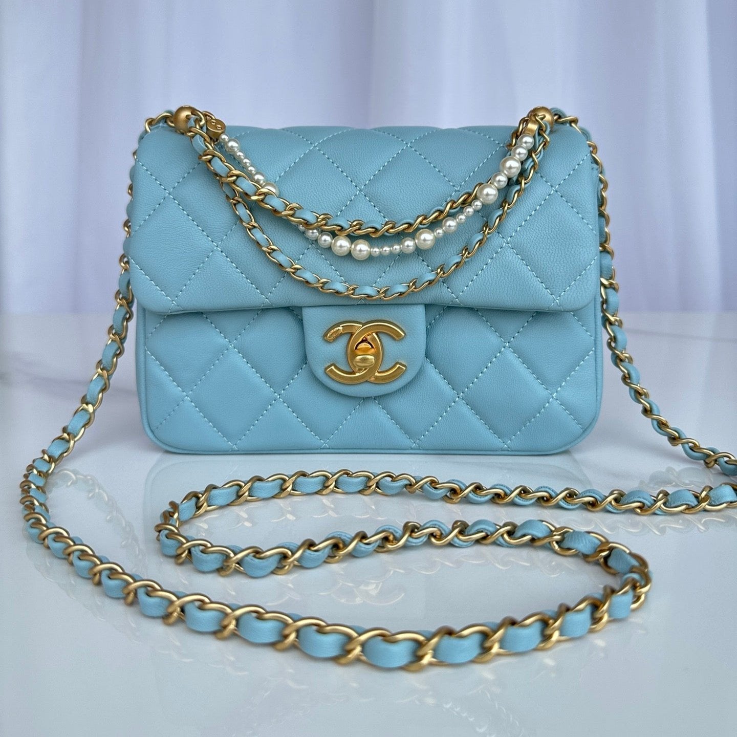 CC SMALL 20 FLAP BAG IN LIGHT BLUE CALFSKIN