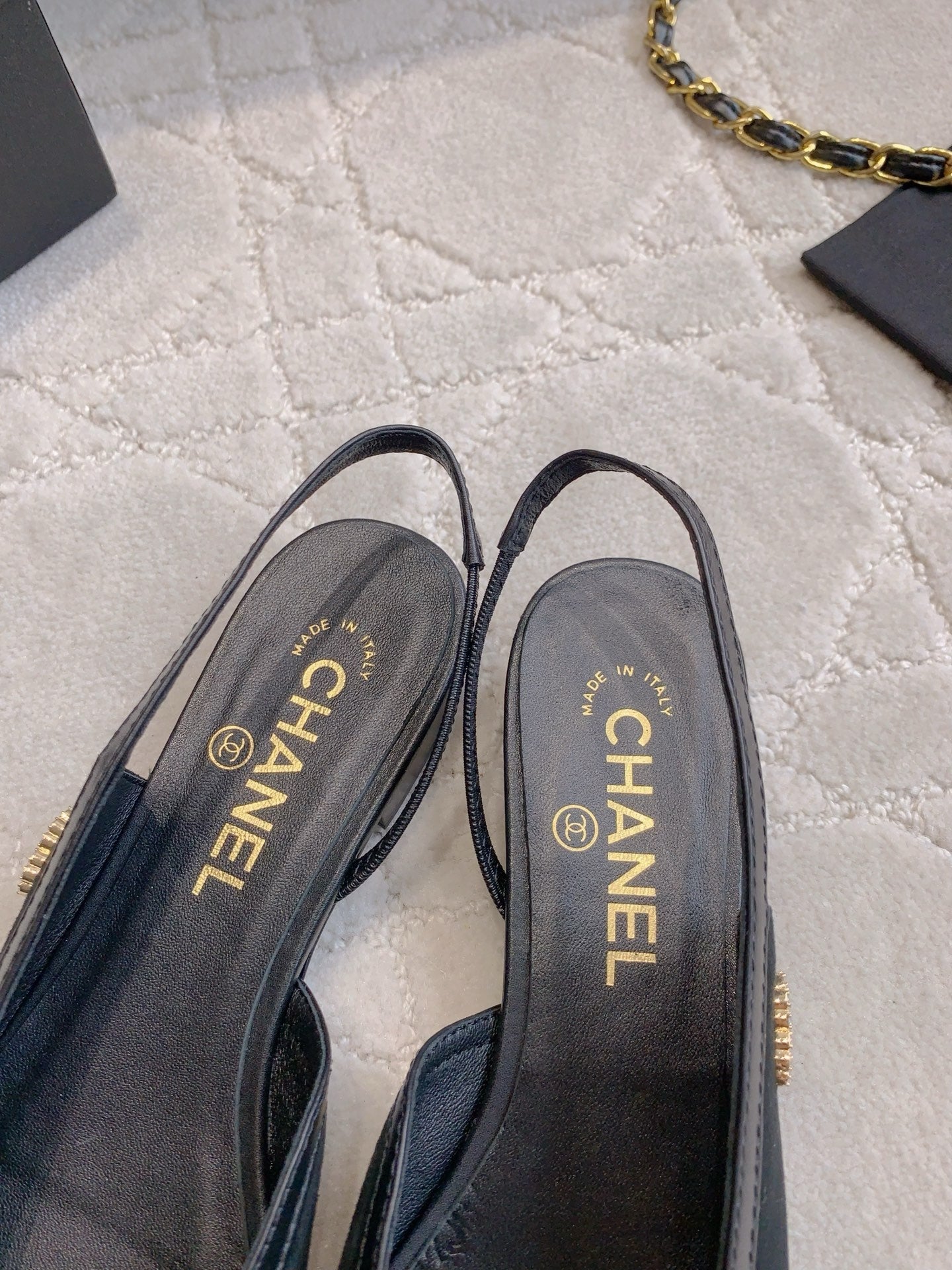 CHANEL 25S SLINGBACK IN BLACK CALFSKIN AND SUEDE GOLD HARDWARE