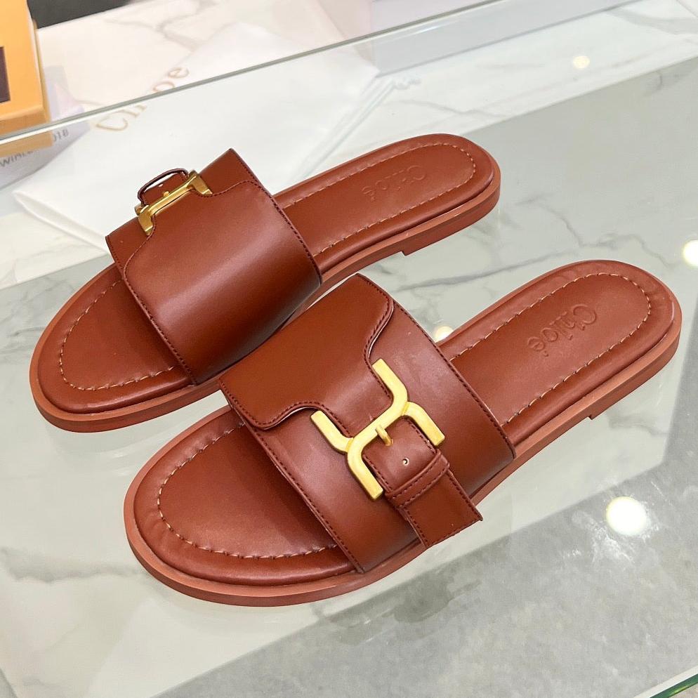MARCIE SLIDE IN UMBER BROWN CALFSKIN WITH GOLD HARDWARE
