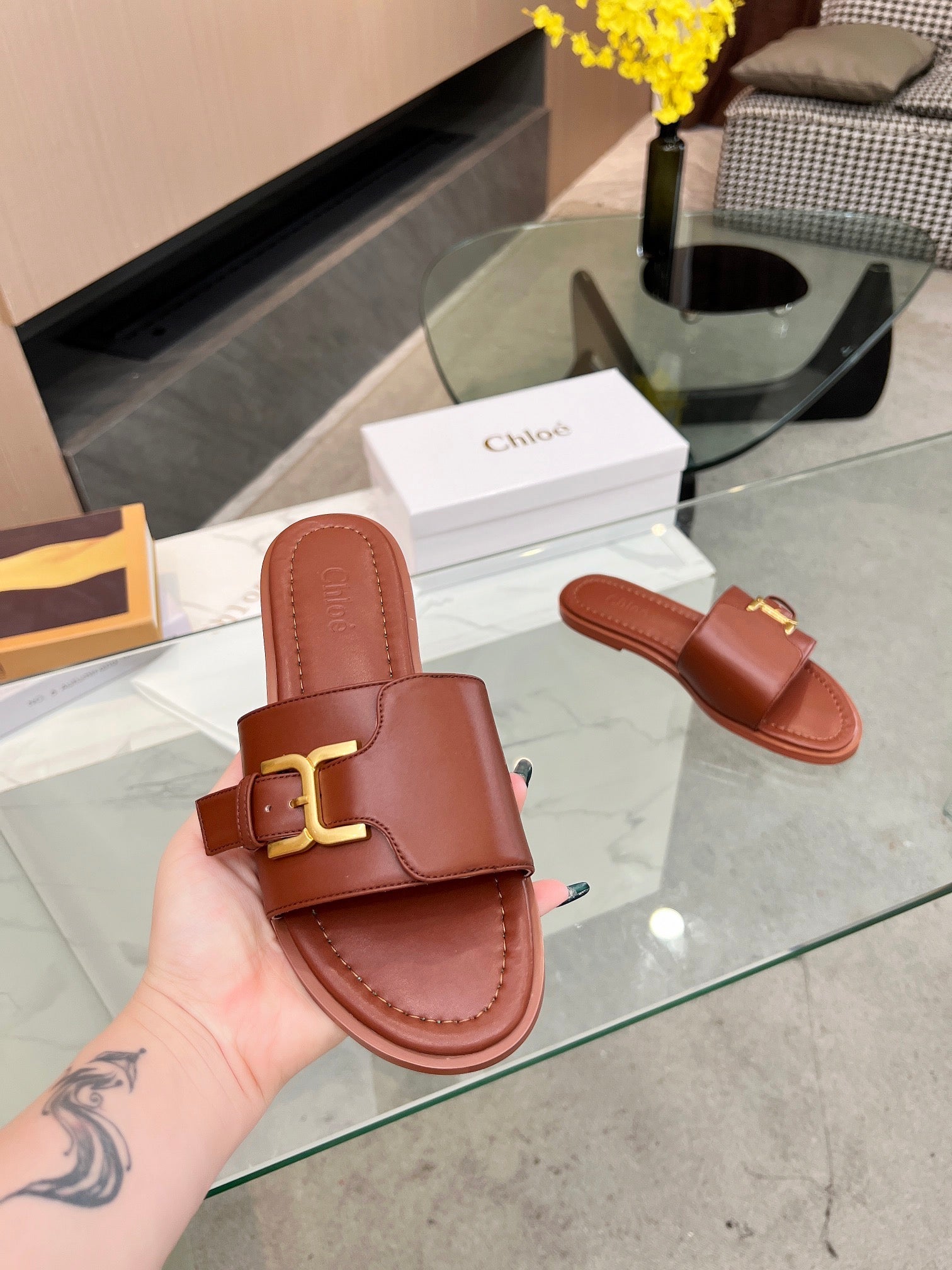 MARCIE SLIDE IN UMBER BROWN CALFSKIN WITH GOLD HARDWARE