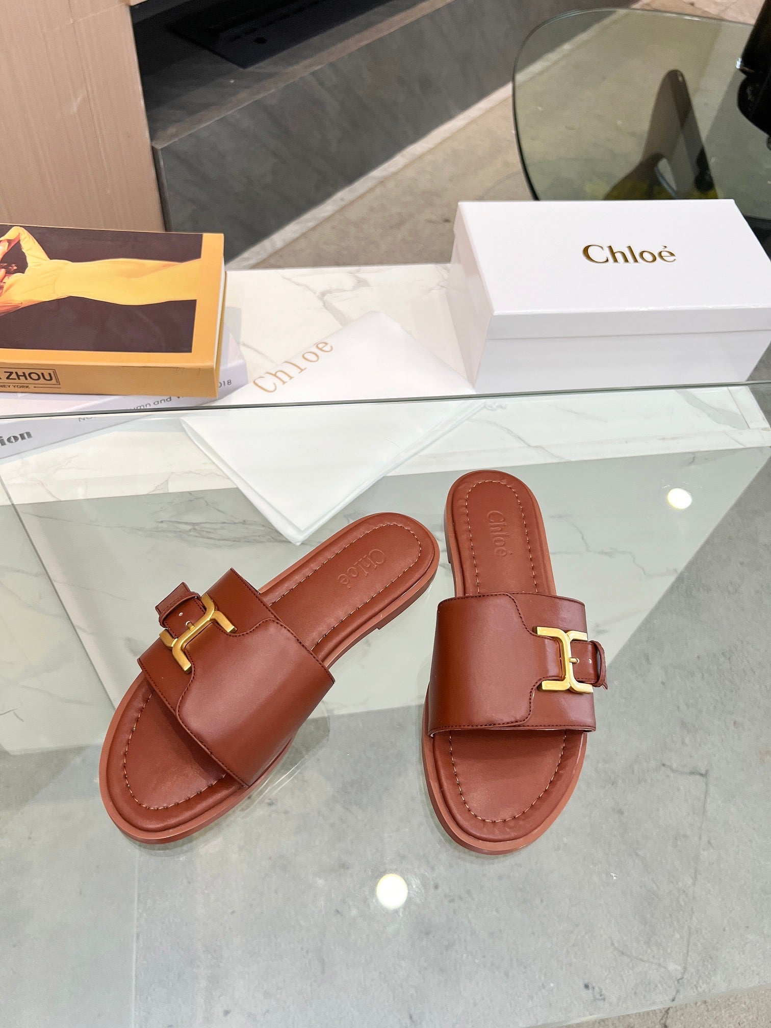 MARCIE SLIDE IN UMBER BROWN CALFSKIN WITH GOLD HARDWARE