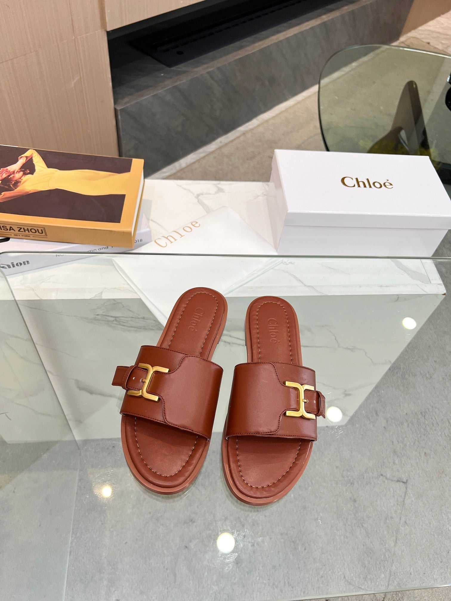 MARCIE SLIDE IN UMBER BROWN CALFSKIN WITH GOLD HARDWARE