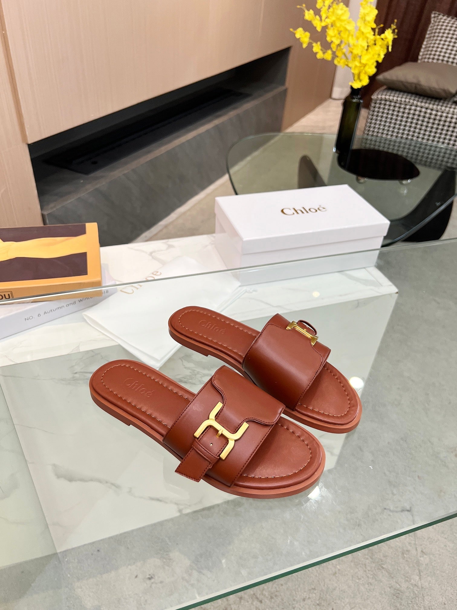 MARCIE SLIDE IN UMBER BROWN CALFSKIN WITH GOLD HARDWARE