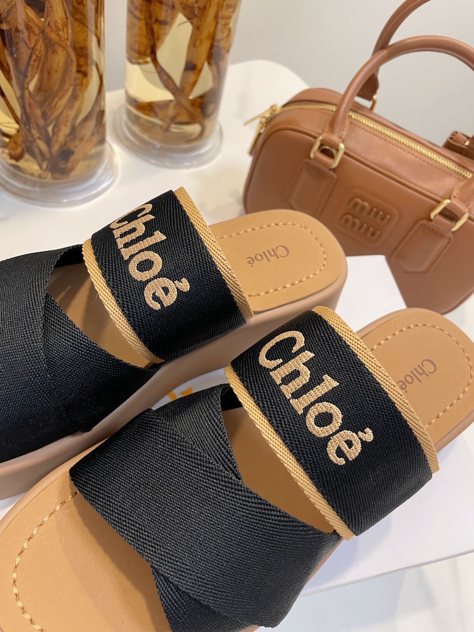 WOODY WEDGE SANDALS IN BLACK CANVAS WITH CIDER BROWN RUBBER SOLE