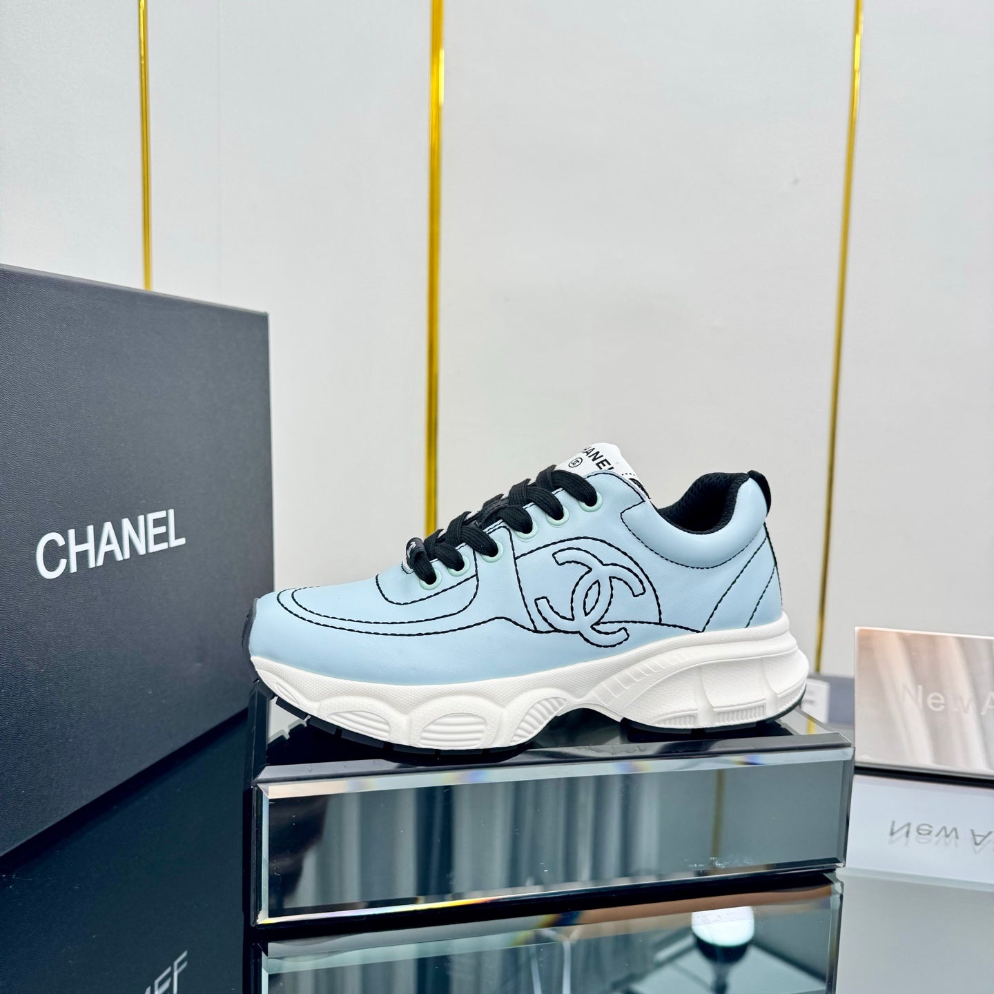 TRAINERS SNEAKER IN LIGHT BLUE CALFSKIN WITH BLACK EMBROIDERED