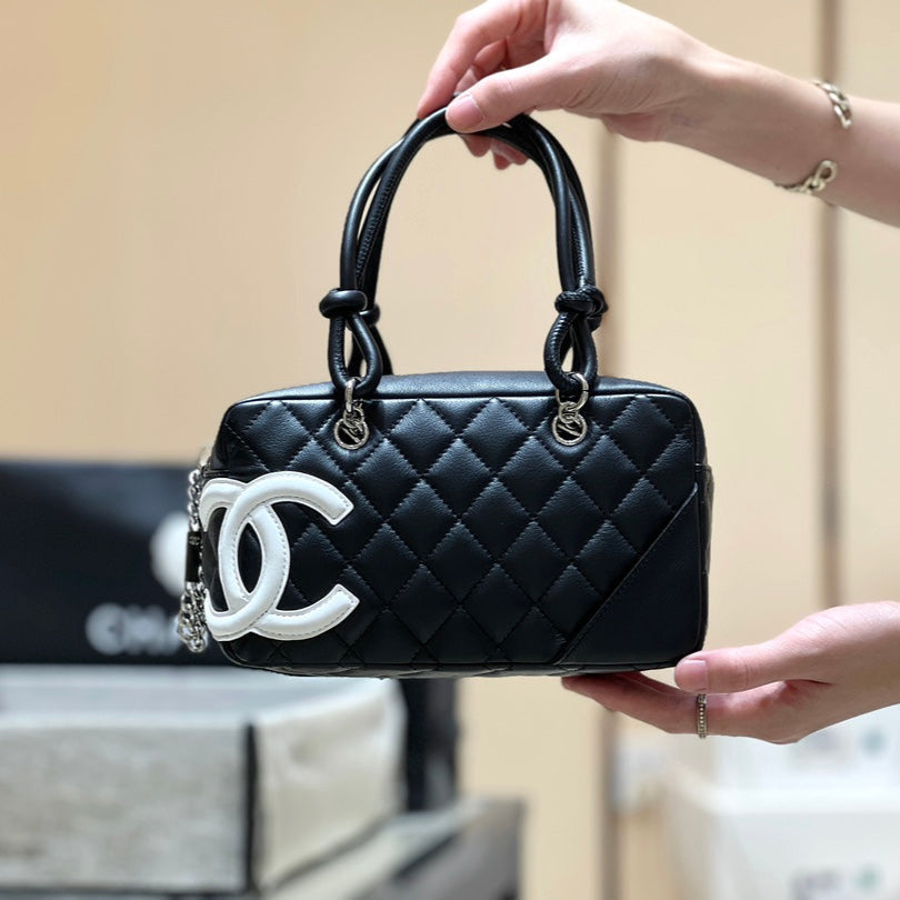 25S CHANEL CAMBON BOSTON BAG 27 IN BLACK AND WHITE CALFSKIN