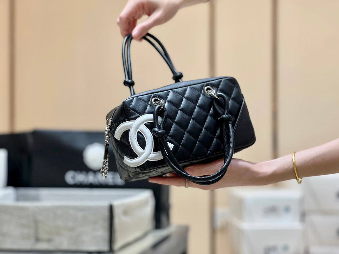 25S CHANEL CAMBON BOSTON BAG 27 IN BLACK AND WHITE CALFSKIN