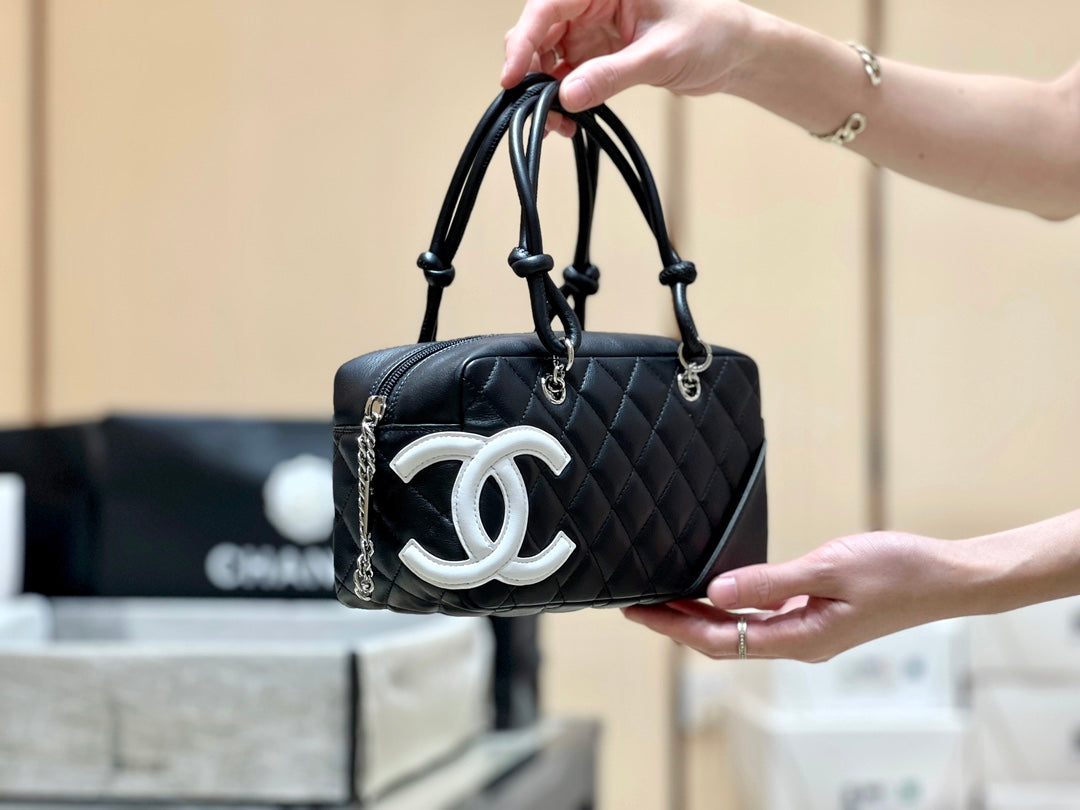 25S CHANEL CAMBON BOSTON BAG 27 IN BLACK AND WHITE CALFSKIN